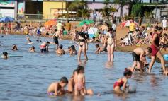 Foto de la galería: Sol, playa y rio, postales de verano en la ciudad capital